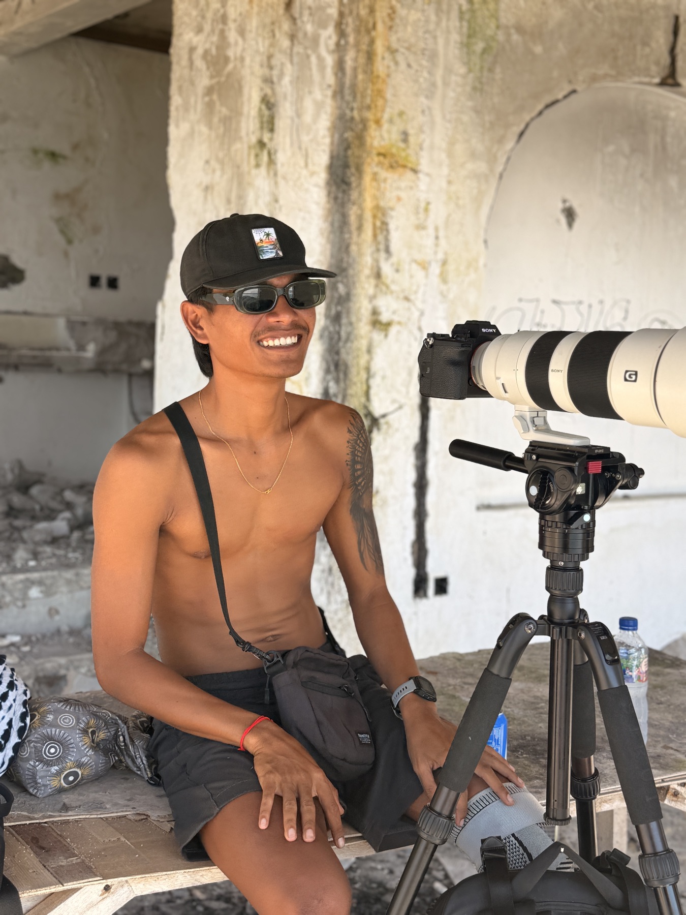 Arik shooting on land with the long lens